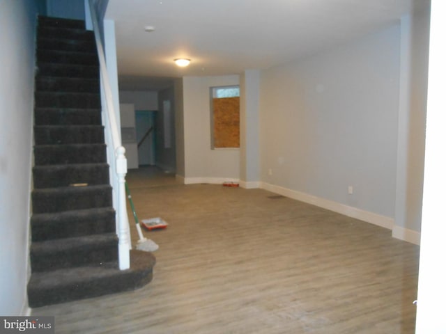 interior space with hardwood / wood-style floors