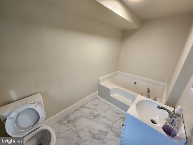 bathroom with a washtub and toilet