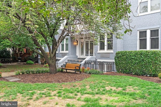 exterior space featuring a lawn