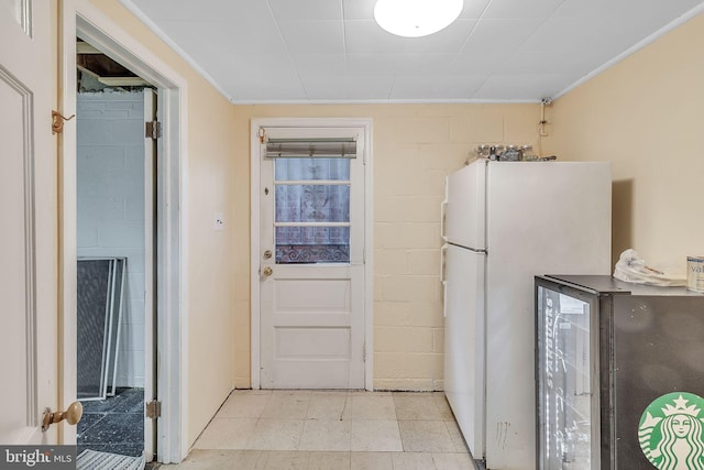 kitchen featuring refrigerator and white refrigerator