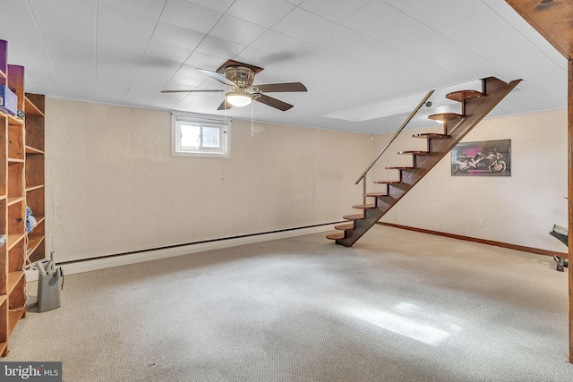 basement with carpet floors and a baseboard radiator