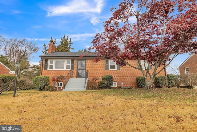 view of front of house with a front lawn