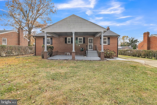 view of front of home with a front lawn