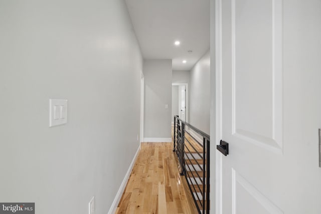 3013 Wharton St, Philadelphia, PA 19146 - hallway featuring an upstairs landing, light wood-type flooring, recessed lighting, and baseboards