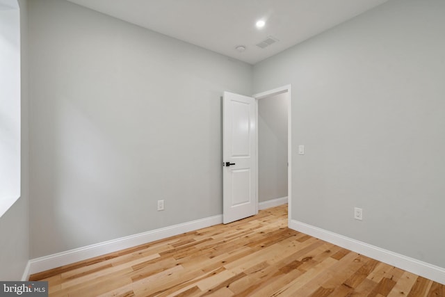 empty room featuring wood-type flooring