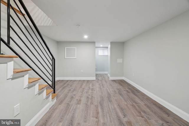 3013 Wharton St, Philadelphia, PA 19146 - basement featuring stairs, recessed lighting, wood finished floors, and baseboards