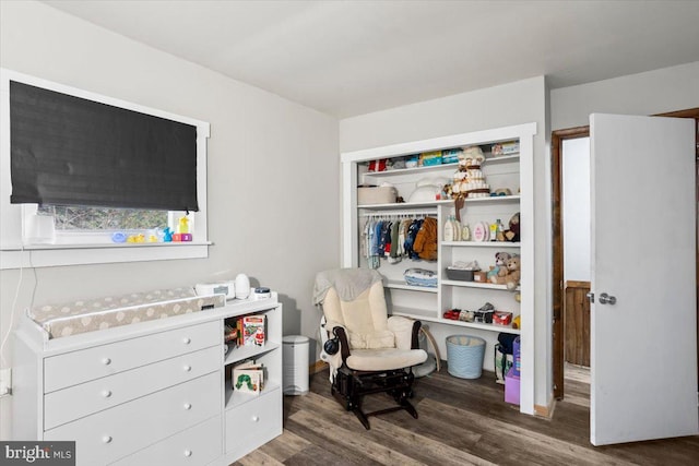 living area with dark wood-type flooring