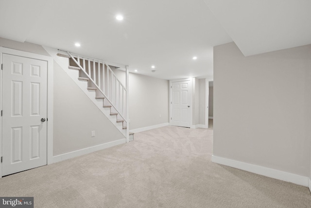 basement with light carpet