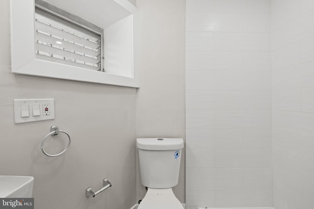 bathroom featuring toilet