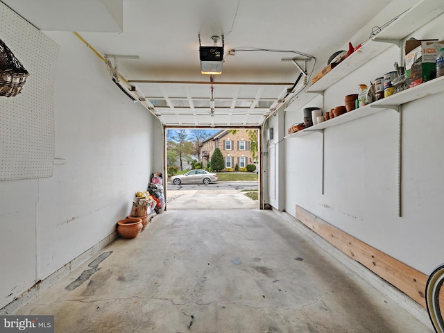 garage featuring a garage door opener