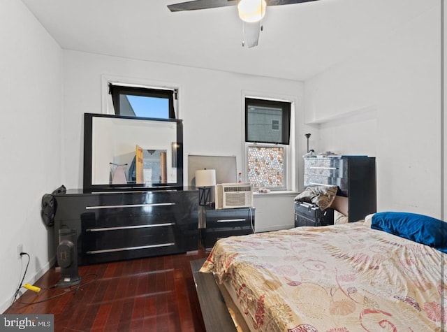 bedroom featuring ceiling fan and dark wood-type flooring