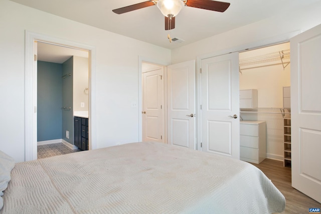 bedroom featuring ceiling fan and wood-type flooring