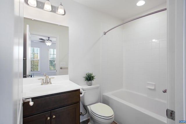 full bathroom with vanity, shower / washtub combination, toilet, and ceiling fan