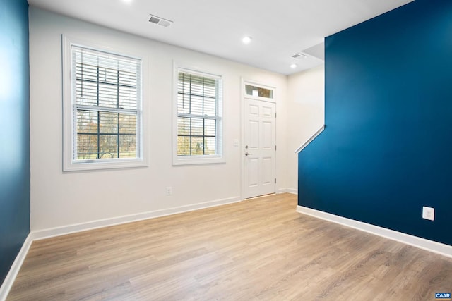 foyer with light wood-type flooring