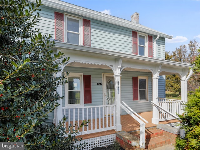 view of front of property featuring covered porch