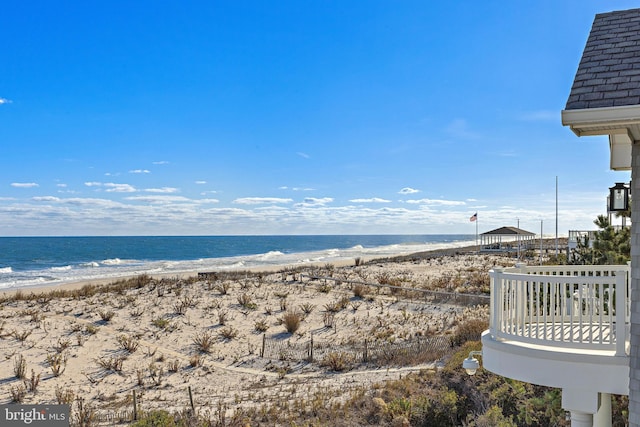 property view of water with a beach view