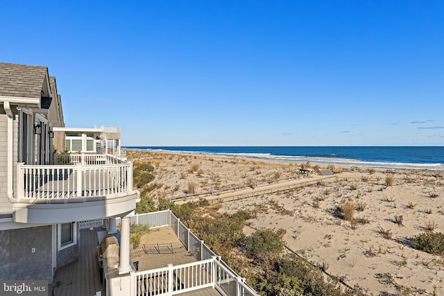 property view of water featuring a beach view