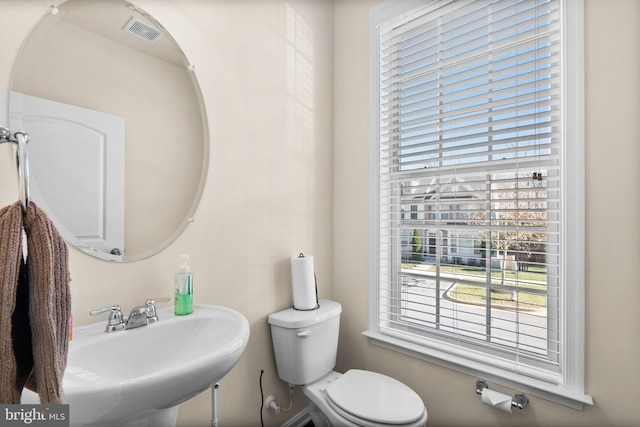 bathroom with sink and toilet