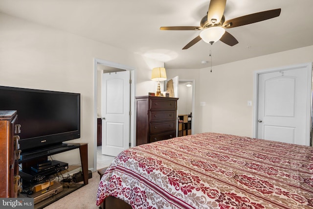 bedroom featuring ceiling fan and light carpet