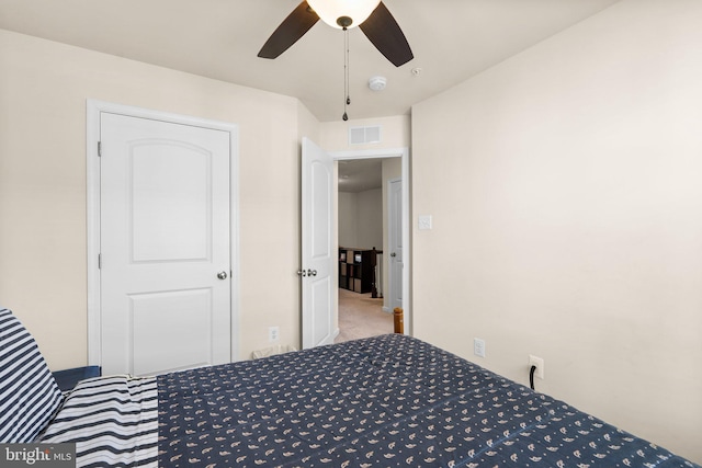 unfurnished bedroom with carpet floors and ceiling fan