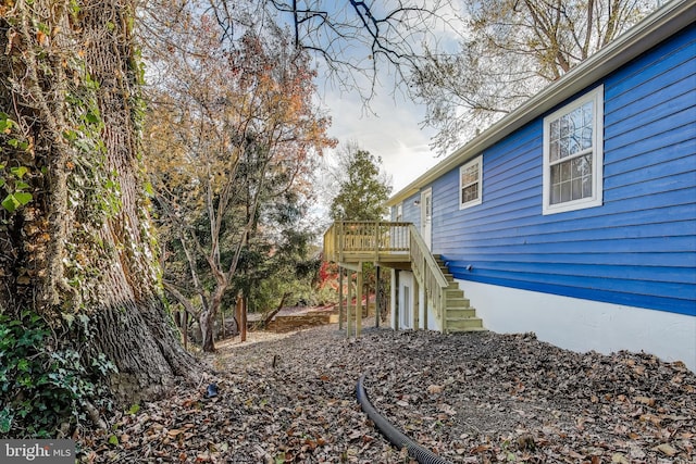 view of yard featuring a wooden deck