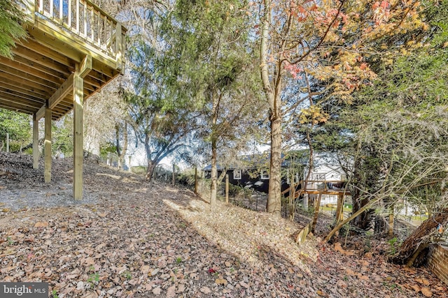 view of yard with a deck