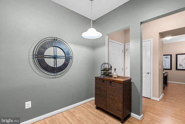 hallway featuring light hardwood / wood-style flooring