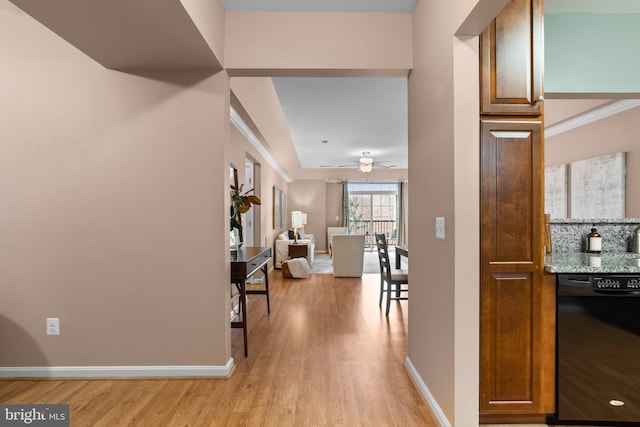 hall with light hardwood / wood-style floors