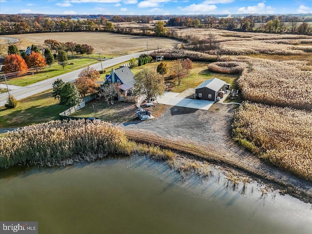 drone / aerial view featuring a rural view and a water view