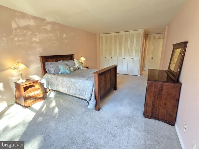 bedroom with light carpet