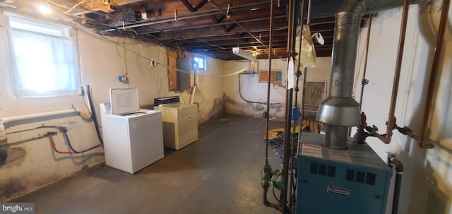 basement with washing machine and clothes dryer