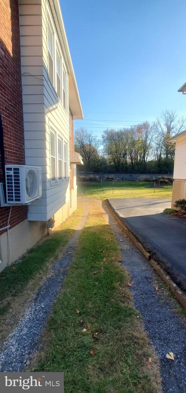 view of yard featuring ac unit