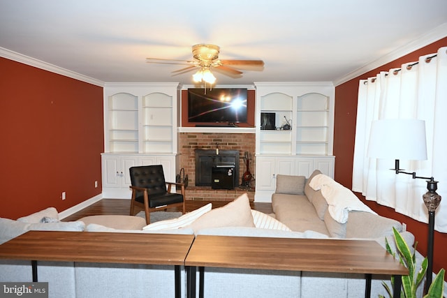 living room with ceiling fan, wood-type flooring, and ornamental molding