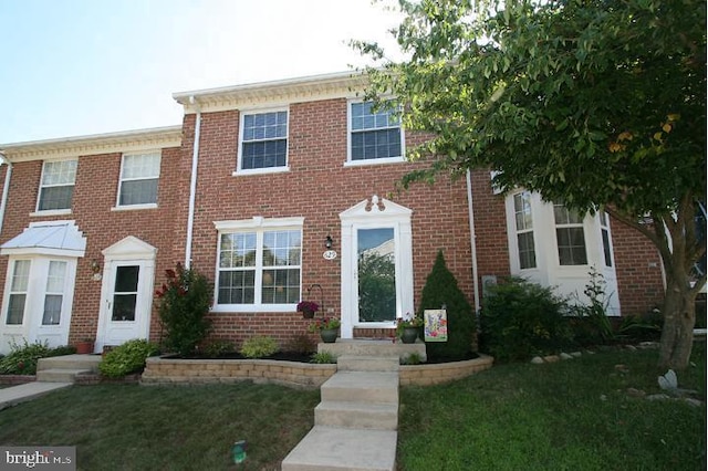 view of front of house with a front lawn