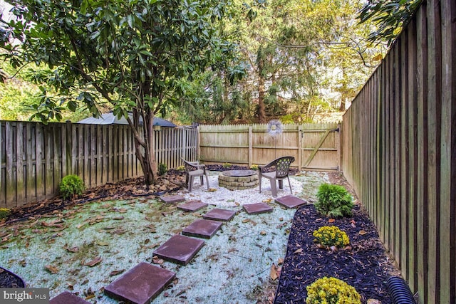 view of patio / terrace featuring a fire pit