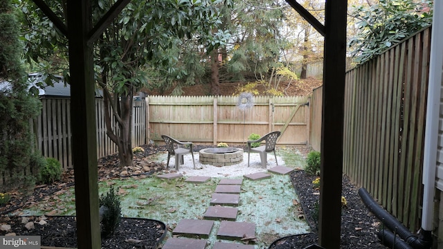 view of patio featuring a fire pit