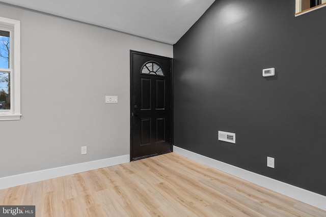 foyer entrance featuring hardwood / wood-style flooring