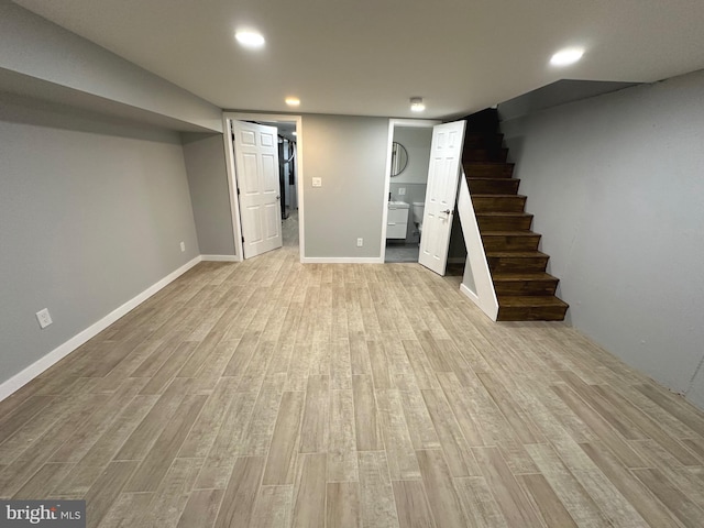 basement featuring light wood-type flooring