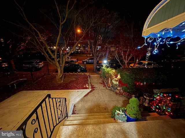 view of yard at twilight