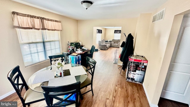 dining area featuring hardwood / wood-style flooring