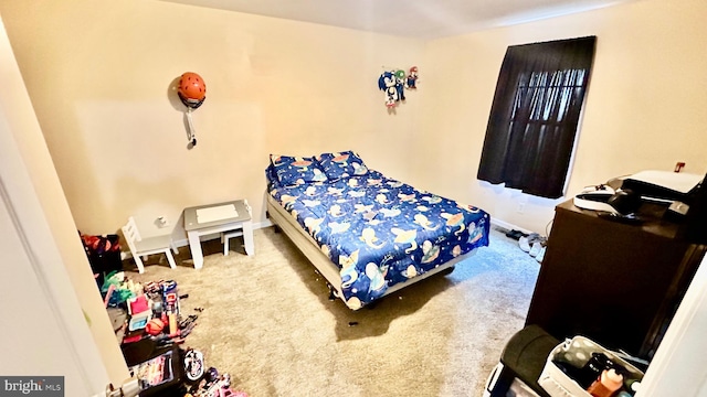 bedroom featuring carpet flooring