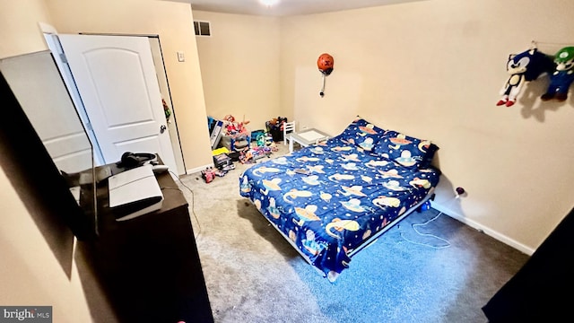 bedroom with carpet and a closet