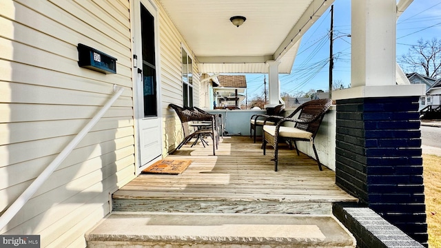 wooden deck with covered porch