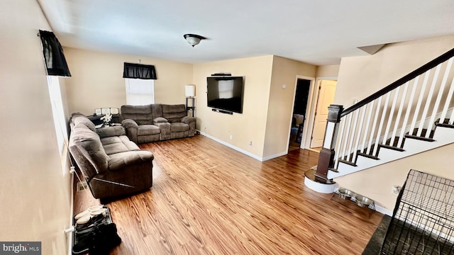 living room with light hardwood / wood-style floors