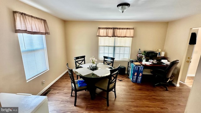 dining room featuring dark hardwood / wood-style floors