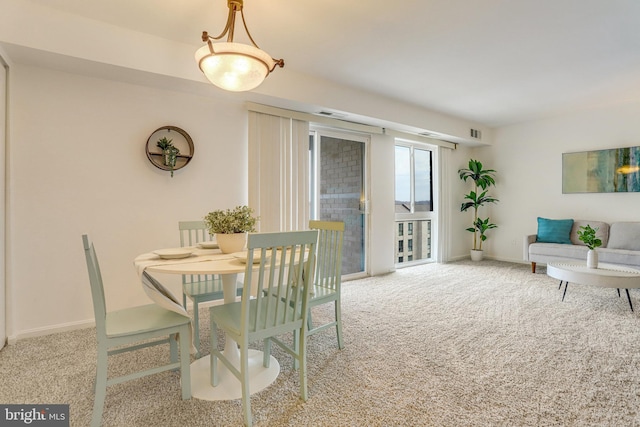 view of carpeted dining room