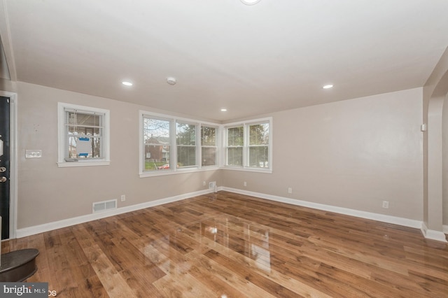 empty room featuring hardwood / wood-style floors