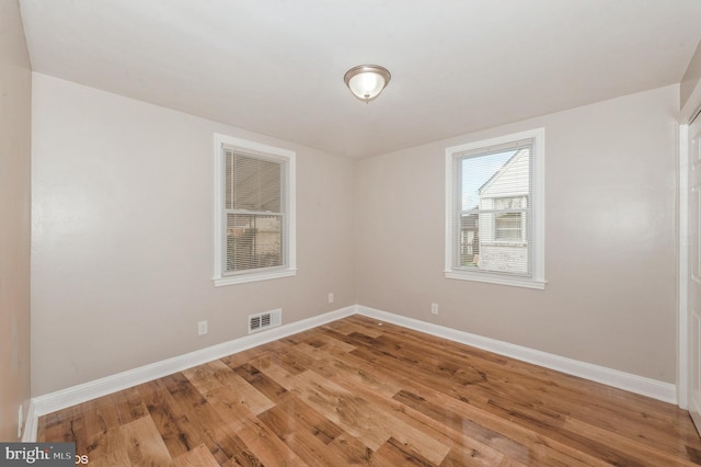 empty room featuring light hardwood / wood-style floors