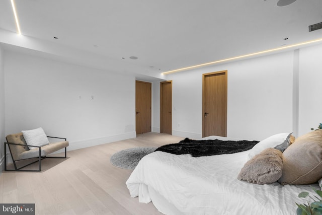 bedroom featuring light hardwood / wood-style floors