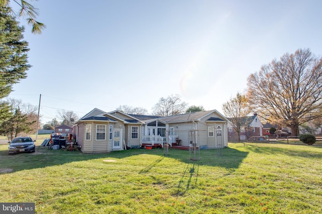 view of front of home with a front yard